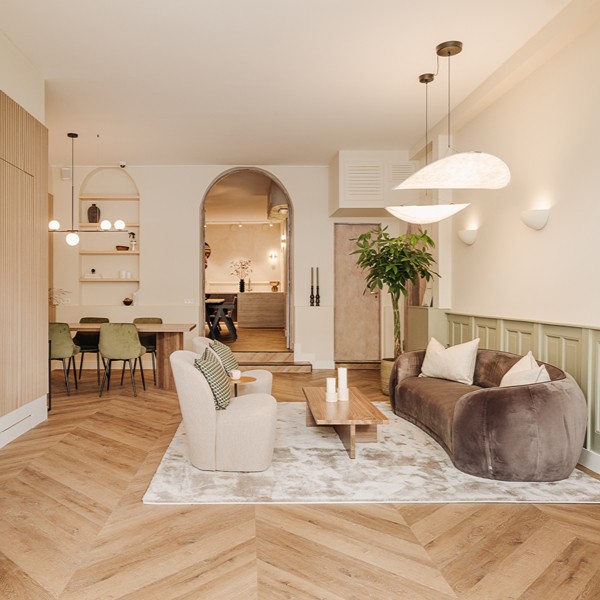 Studio Lindengracht - Zitkamer met bank